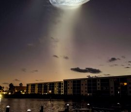 Spacex launch over Cocoa Beach leaving a jellyfish looking cloud in the early morning sky
